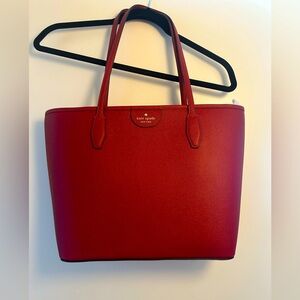 Red Kate spade bag with zipper. NWT